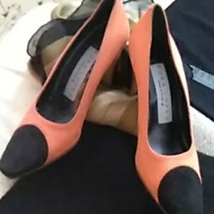 New black and orange suede heels